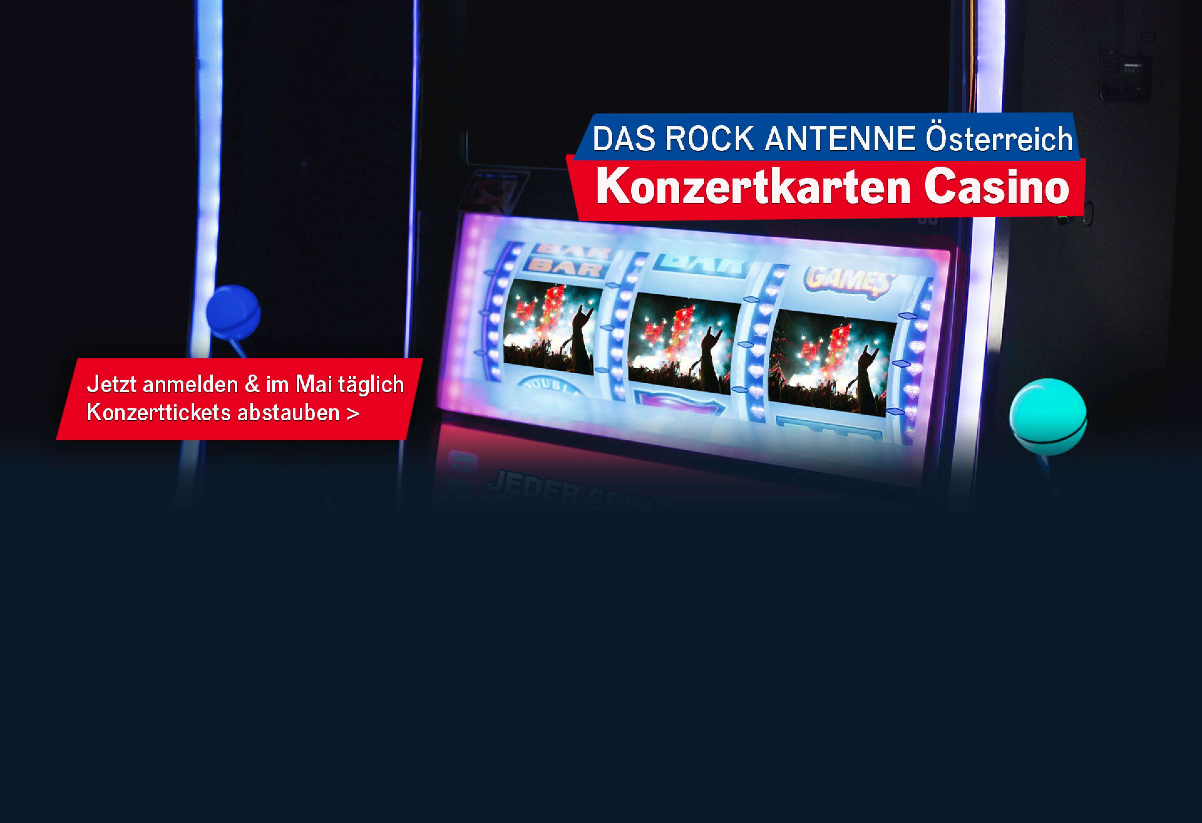 Nahaufnahme des Bildschirms eines Spielautomaten, darauf zu sehen sind drei Fotos von einem Konzert in einer Reihe, dazu der Text: Das ROCK ANTENNE Österreich Konzertkarten Casino -jetzt mitmachen und im Mai täglich Konzertkarten abstauben